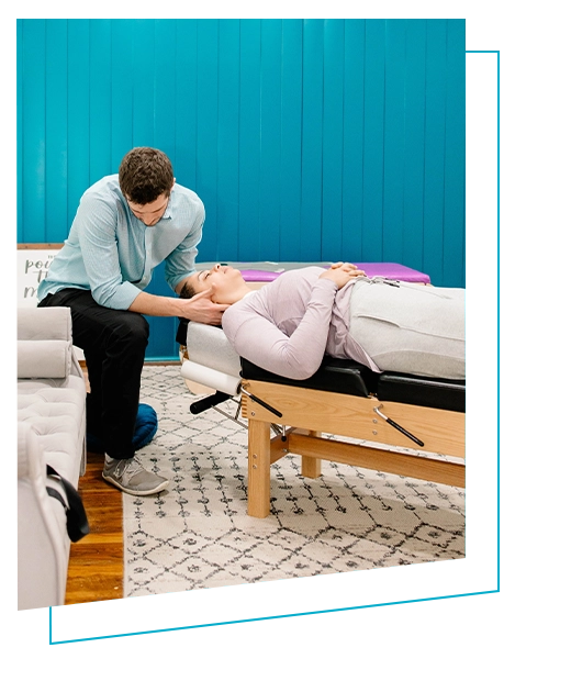 Pediatric Chiropractor Max Carlin Adjusting Patient's Neck